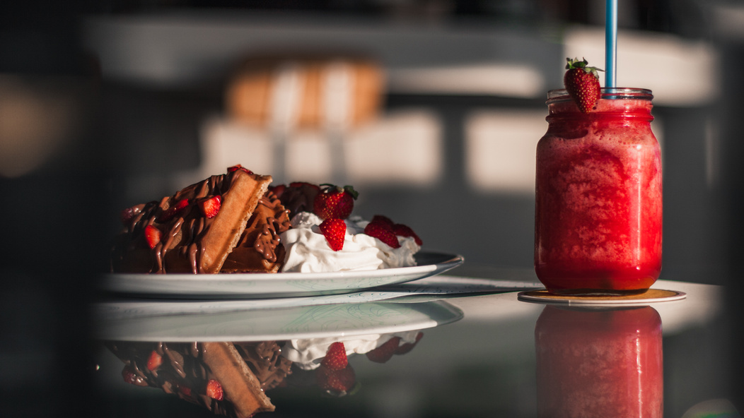 Clear Glass Jar Filled With Red Smoothie